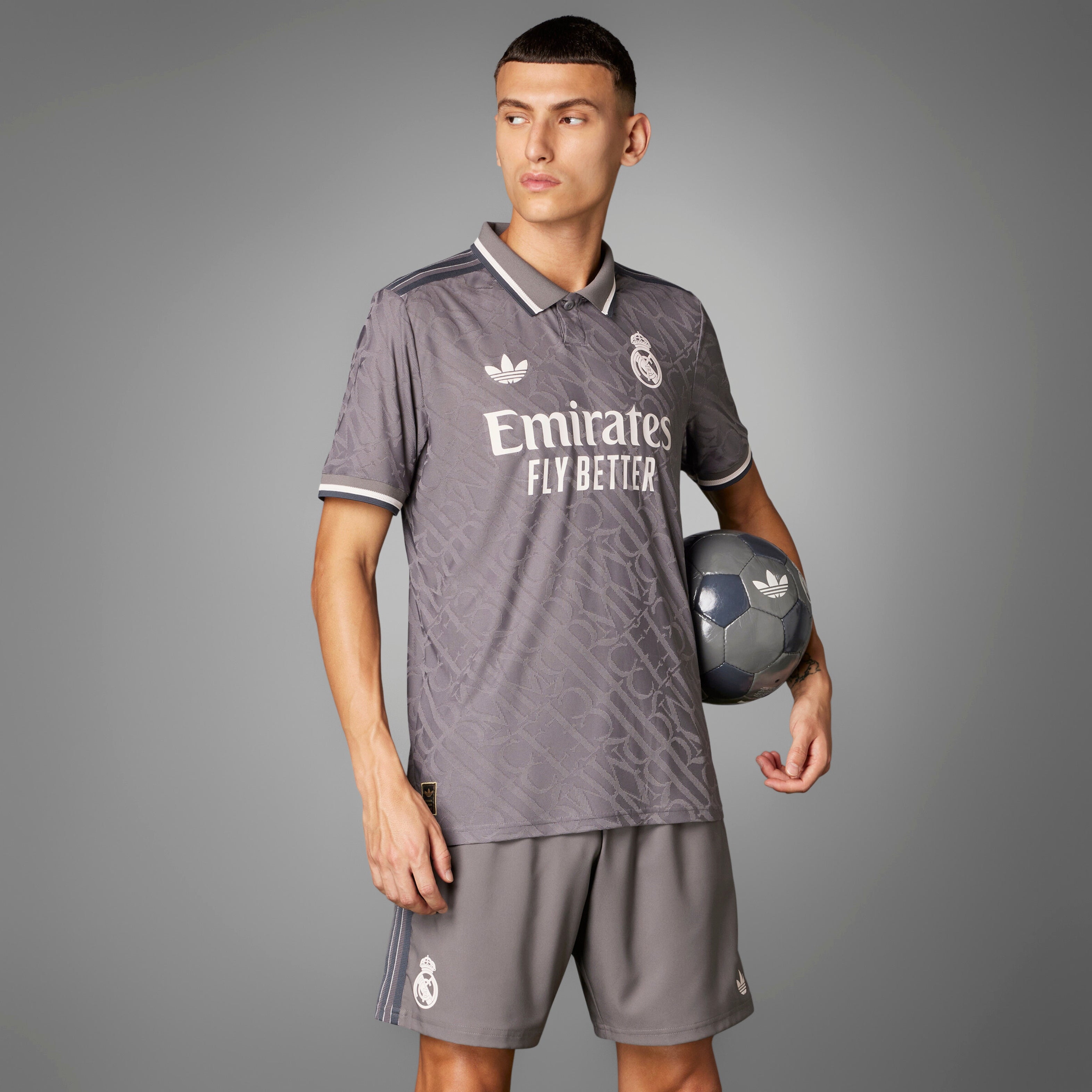 Real Madrid Authentic Third Jersey on Model holding ball to side