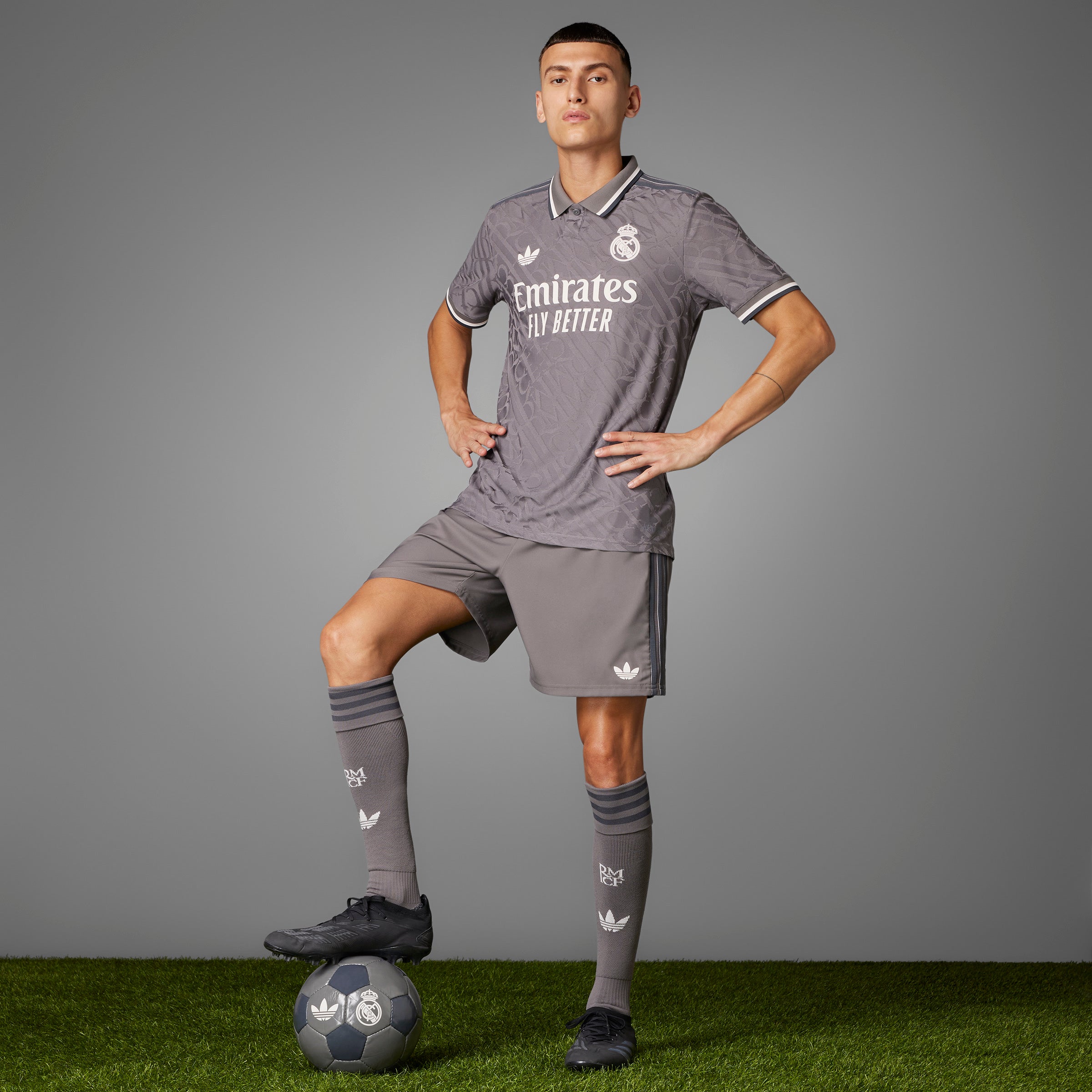 Real Madrid Authentic Third Jersey on Model stepping on ball with hands to hips